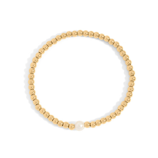 Gold beaded bracelet with a single pearl on a white background